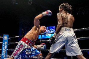 Cruz (L.) launching the overhand right.