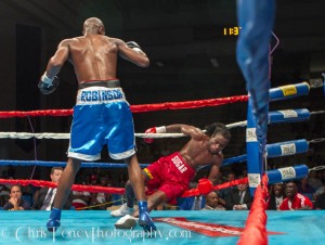 Robinson watches as Narh falls into the ropes.