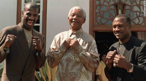 (Pretoria, South Africa – Dec. 6, 1997)  Michael Spinks, Mandela and Joe Frazier AFPGetty Images