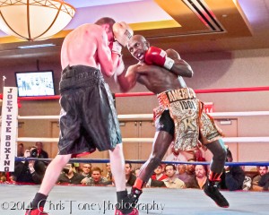 Farmer (R.) landing the right uppercut.