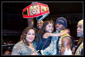 Livvy and Kennedy being held by her dad - the new USBA heavyweight champion.