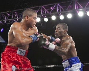 Perez (L.) landing the left jab on Brunson