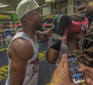 Mayweather coaching Gervonta Davis at Mayweather Boxing    Club.jpg5