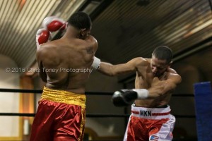 Cordero (L ) connecting with an uppercut